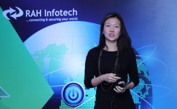 Ipswitch Presents Demonstration of WhatsUp Gold and MOVEit Lyn Kwek- addressing the audience