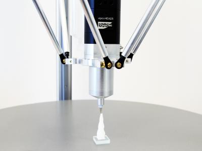 Additive manufacturing with liquid materials