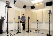 Spirent Named as Authorized Test Lab for Amazon Alexa Built-in Brett Day, lab manager, makes final adjustments for Spirent's Amazon test lab.)