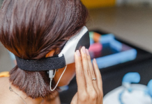 Digital headwear equipment sensor connected to the ear. Source: Adobe Stock