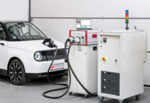 Keysight's SL1202A Scienlab Regenerative AC Emulator (right) with SL1040A Scienlab Charging Discovery System (middle) testing an EV's onboard charger (left)