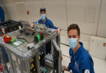 Working on the printer during the flight (Source: ESA)